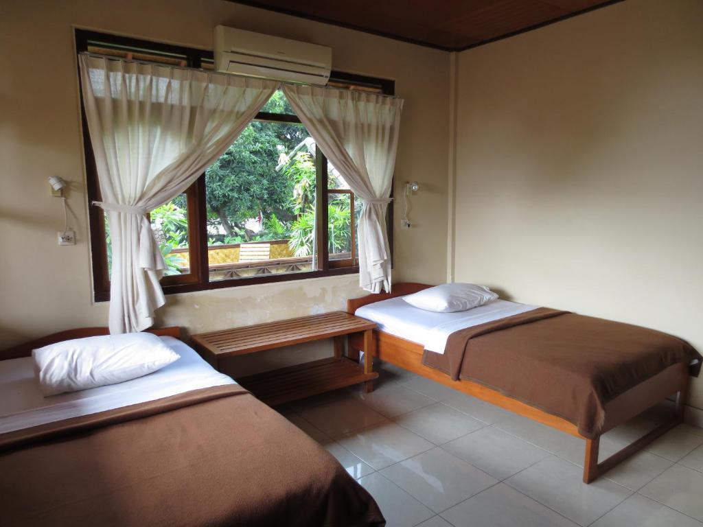 Paradise Palm Beach Bungalows And Dive Center Tulamben Pokoj fotografie